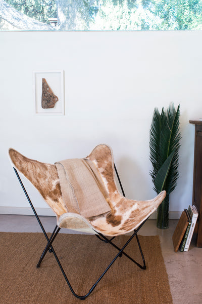 THE CAPPUCCINO COWHIDE BUTTERFLY CHAIR