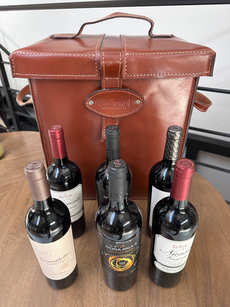 Caja de vino de cuero de lujo para 6 botellas con asas.