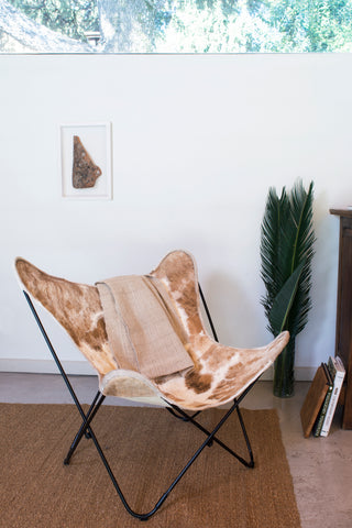 THE CAPPUCCINO COWHIDE BUTTERFLY CHAIR